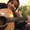 Alaa Albahrani 20 Playing The Guitar