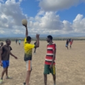 Playing soccer on the beach