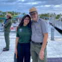 Isra And A Man In A National Park Service Uniform On A Dock