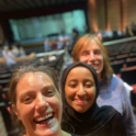 Reem And Two Women In An Auditorium