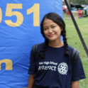 Lintang smiling in a Rotary International tshirt